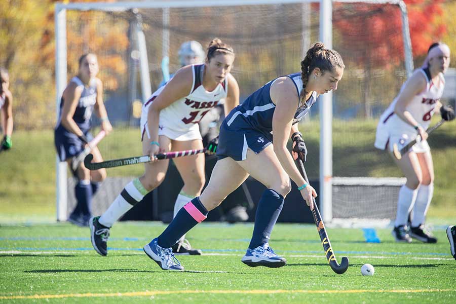 Senior defender Madeleine Goodman dribbles the ball against the Brewers.